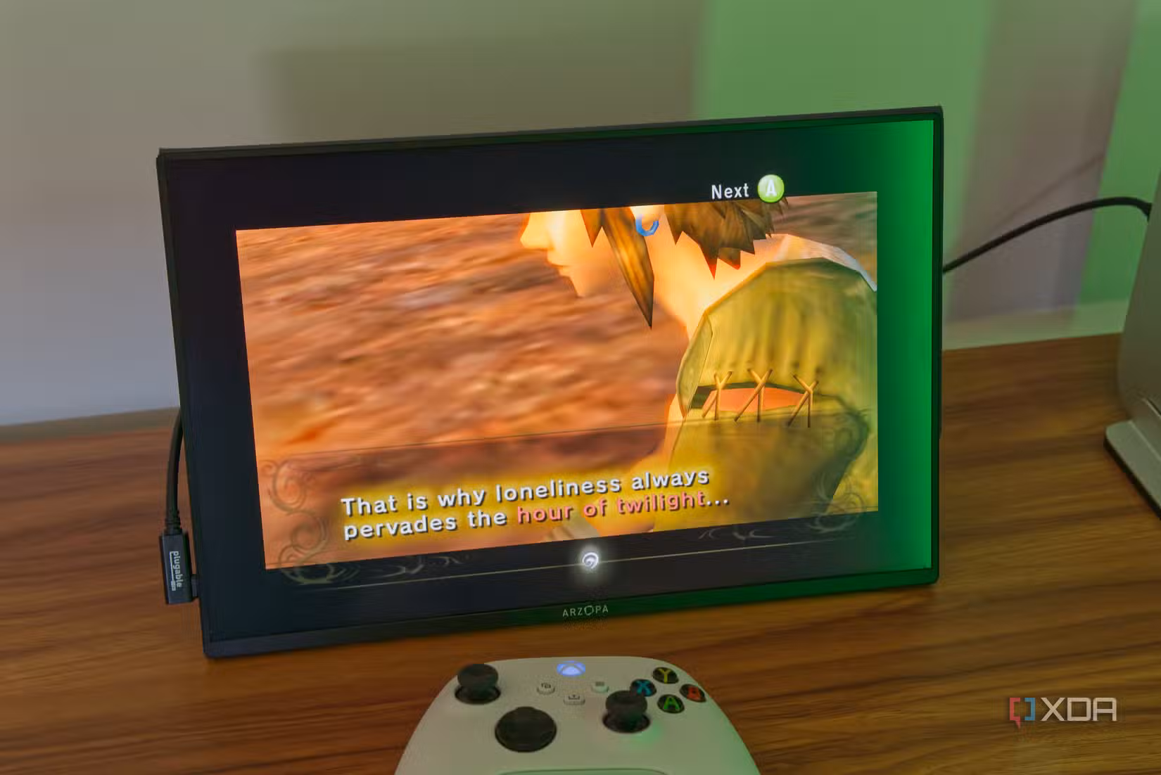 Портативный монитор с запущенной игрой The Legend of Zelda Twilight Princess через эмулятор Портативный монитор с запущенной игрой The Legend of Zelda Twilight Princess через эмулятор